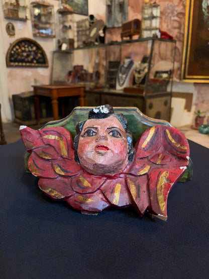 Antique polychrome wood angel shelf bracket with carved cherub, Mexican folk art