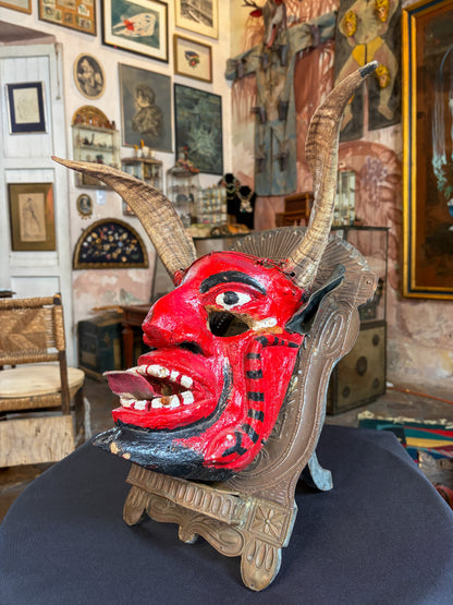 Handcrafted carved wood devil dance mask with leather and organic horns, Mexico, late 20th century, Guerrero, side view