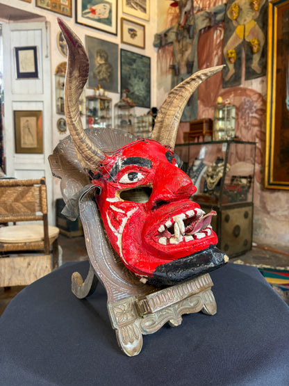 Handcrafted carved wood devil dance mask with leather and organic horns, Mexico, late 20th century, Guerrero, back view