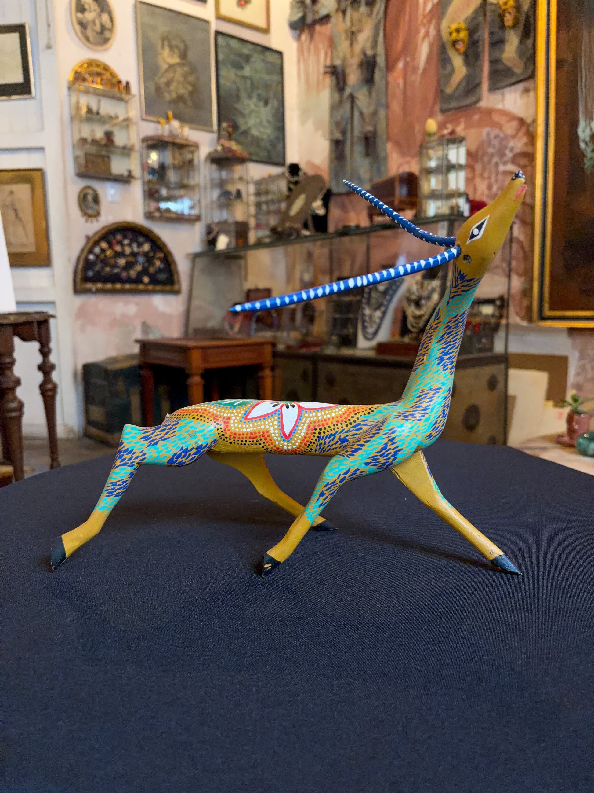 Handcrafted polychrome copal wood Oaxacan deer figure alebrije, Mexican folk art
