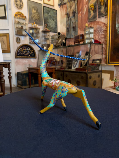 Handcrafted polychrome copal wood Oaxacan deer figure alebrije, Mexican folk art, back view