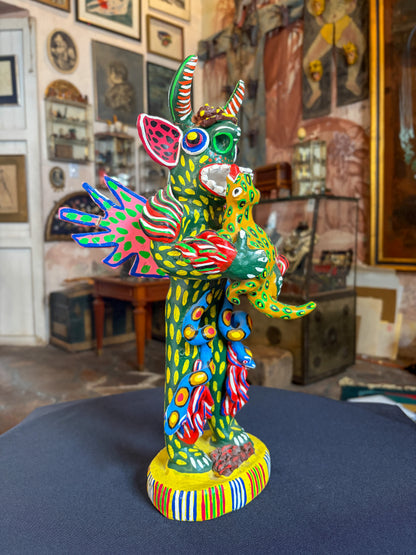 Polychrome fired clay devil figurine with lizard alebrije, Michoacán Mexican folk art, side view