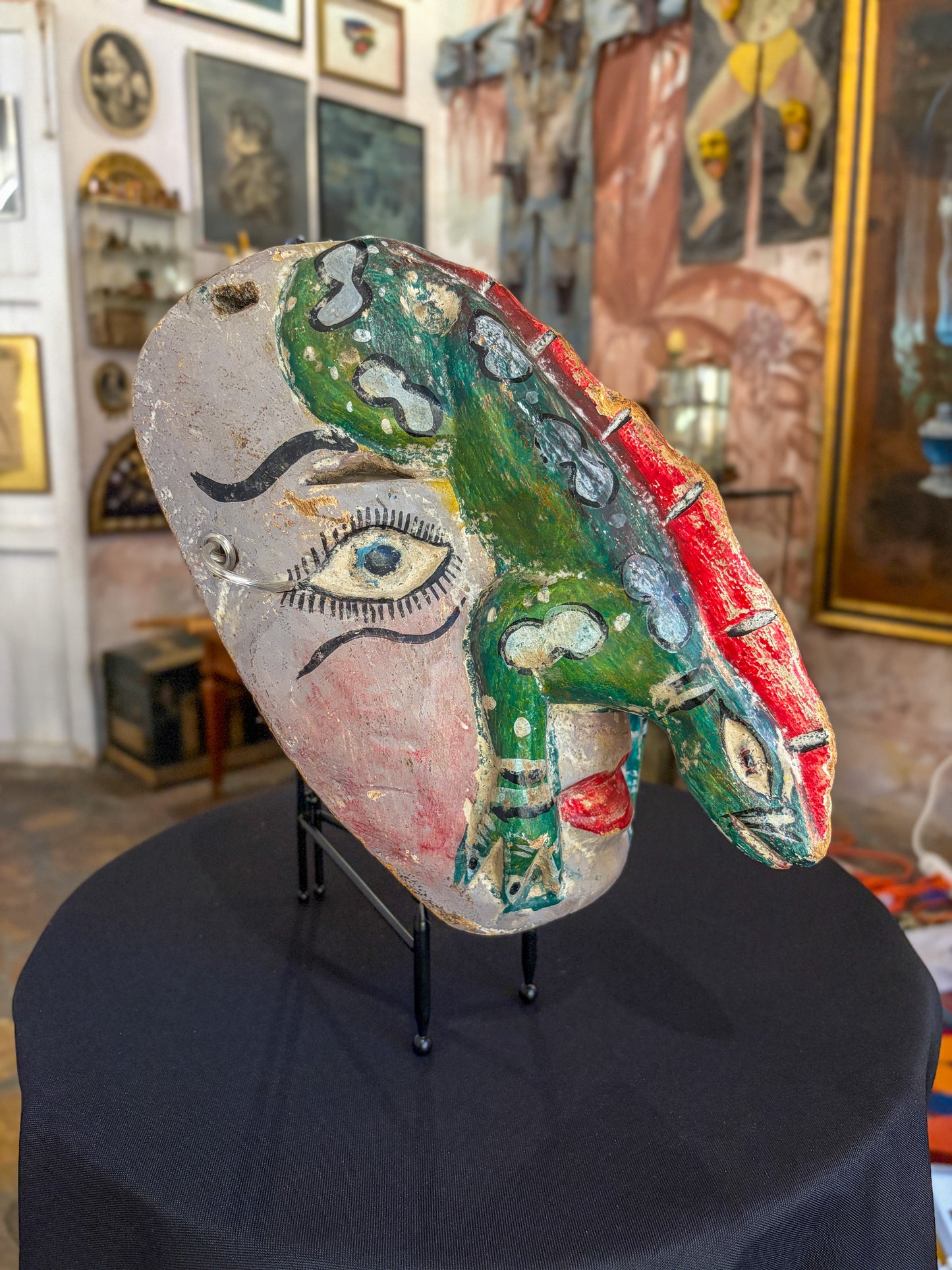 Hand-carved painted wood dance mask with reptile, Guerrero Mexican folk art, back view