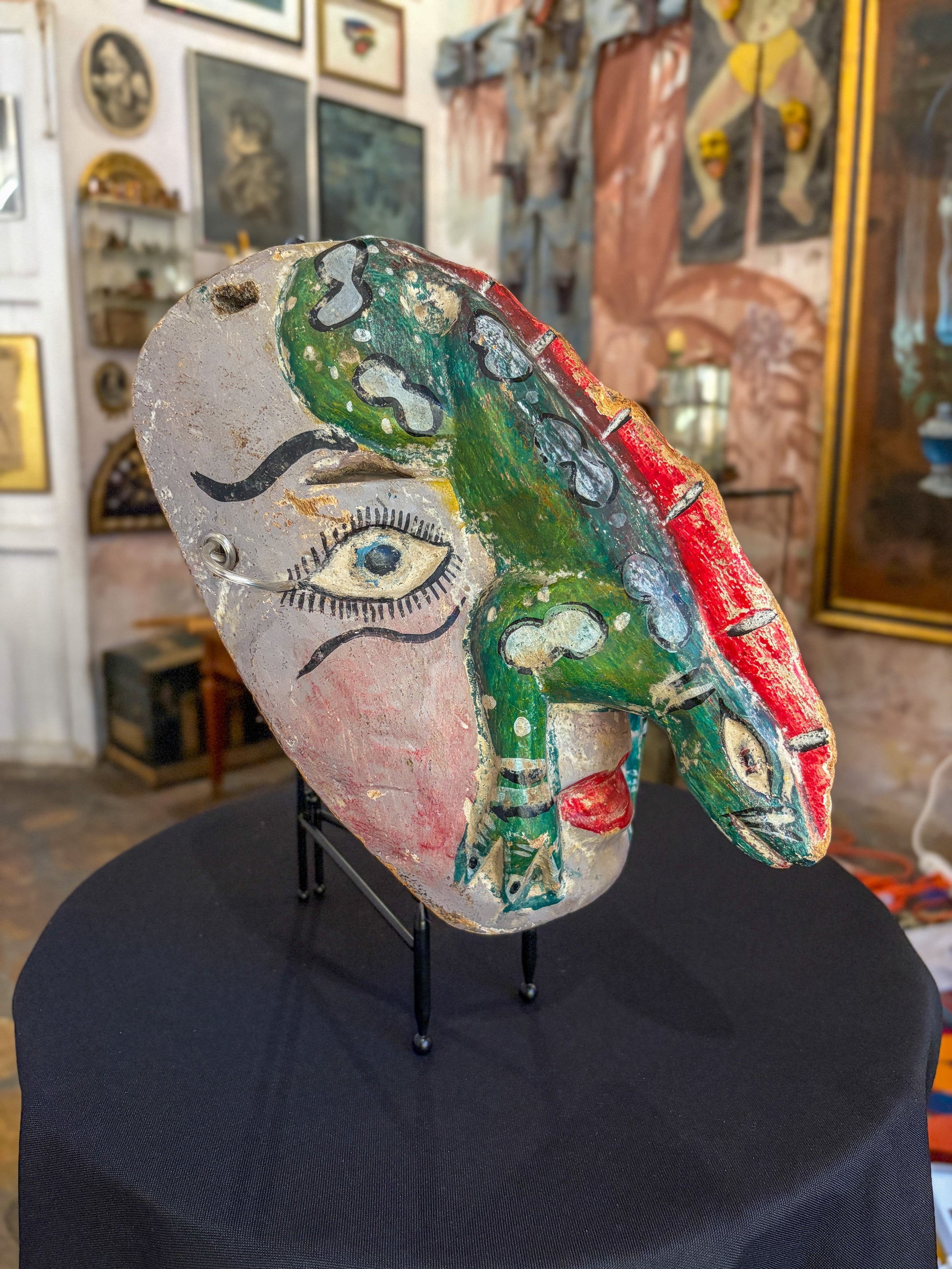 Hand-carved painted wood dance mask with reptile, Guerrero Mexican folk art, back view