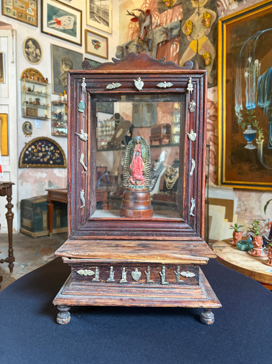 Handcrafted wood niche with metal milagros and glass inlays, Mexican folk art
