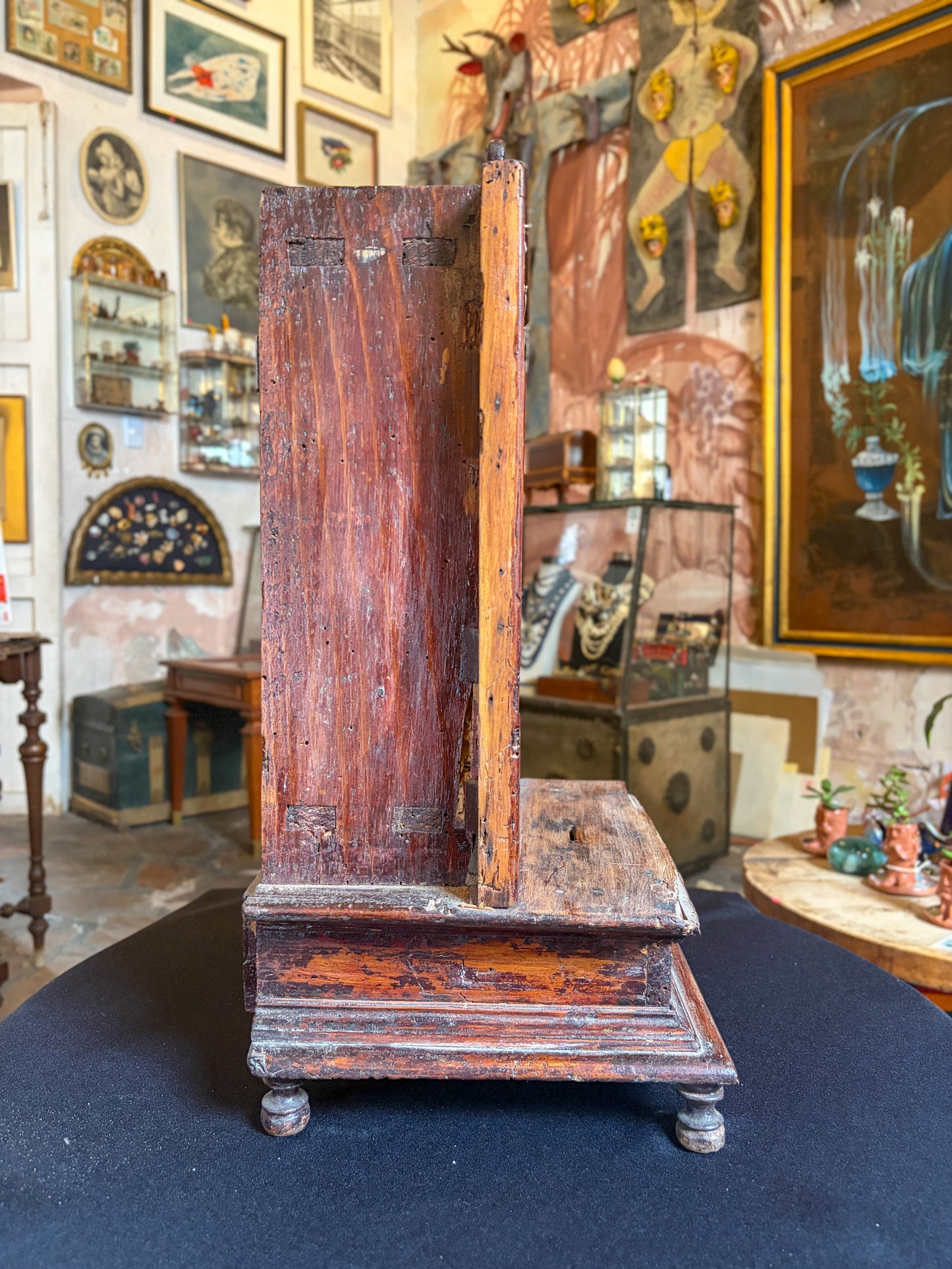 Handcrafted wood niche with metal milagros and glass inlays, Mexican folk art, back view