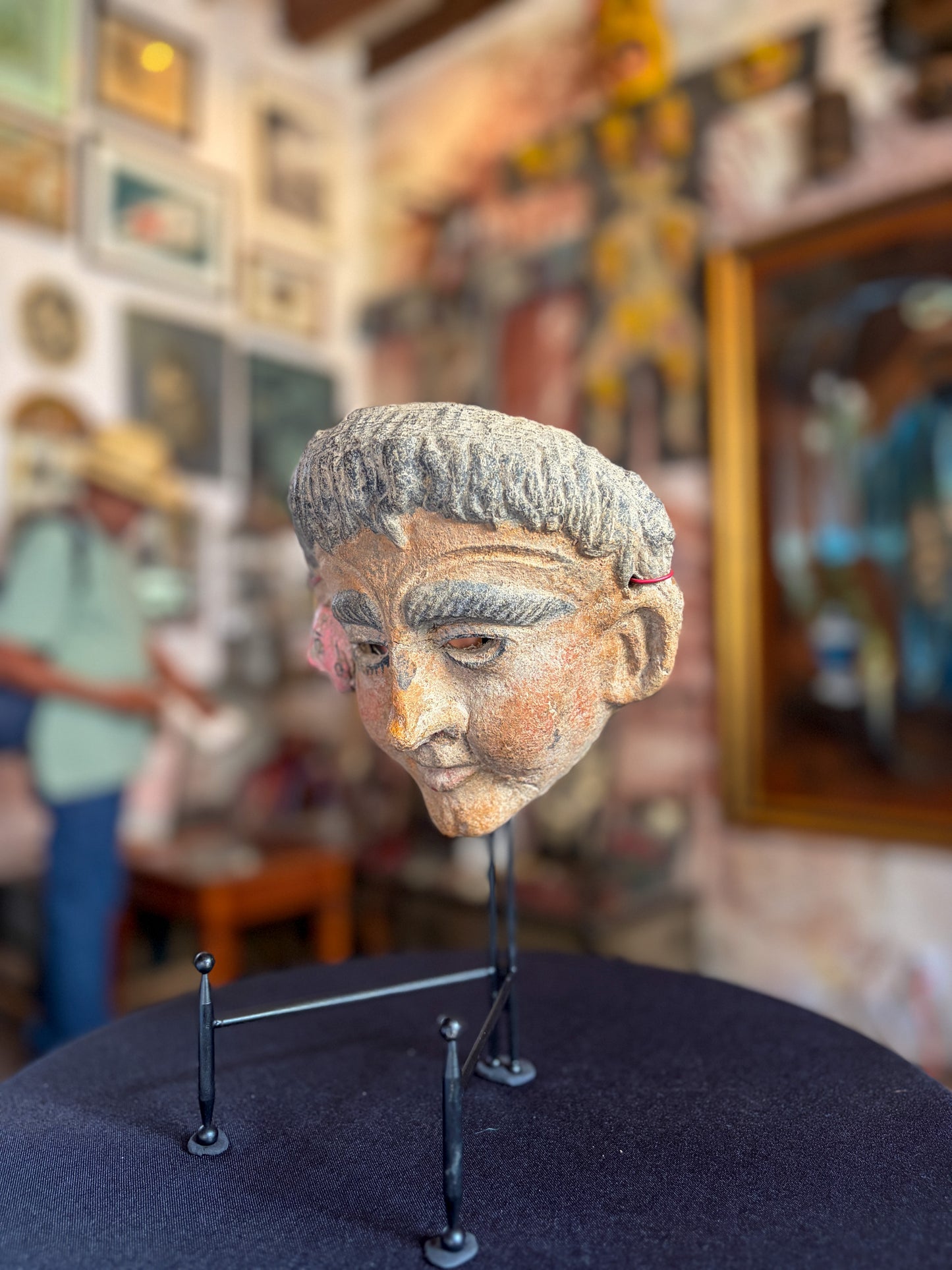 Modeled clay mestizo face miniature mask with pre-Hispanic effigy, Mexican folk art, back view