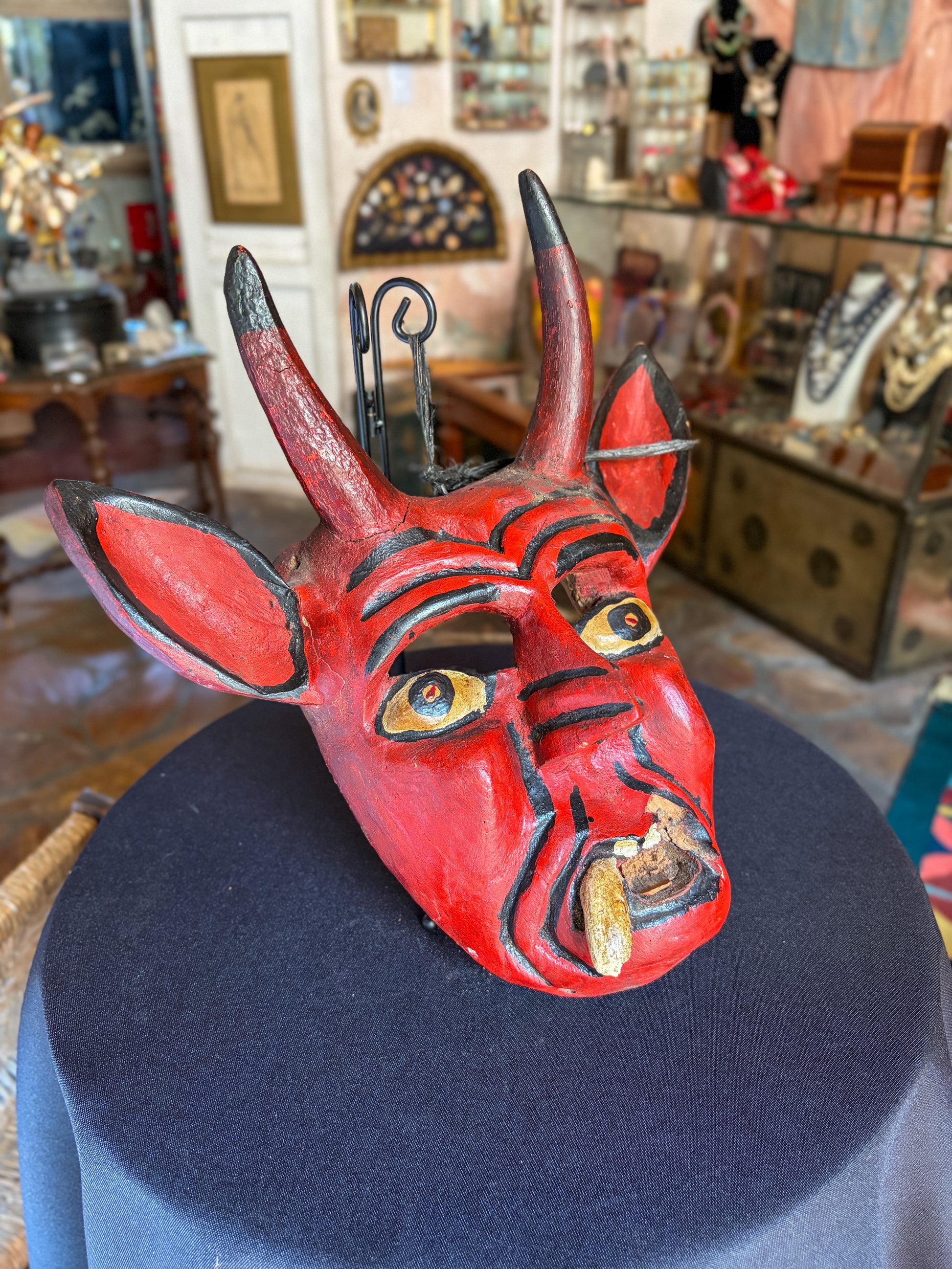 Handcrafted polychrome carved wood red devil dance mask, Guerrero Mexican folk art, back view
