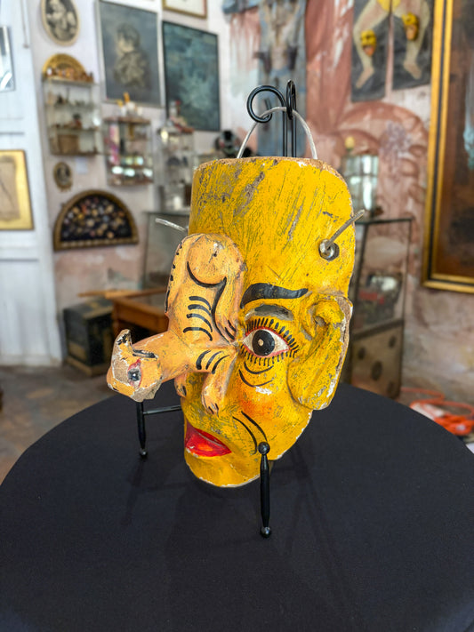 Hand-carved painted wood dance mask with feline, Guerrero Mexican folk art, side view