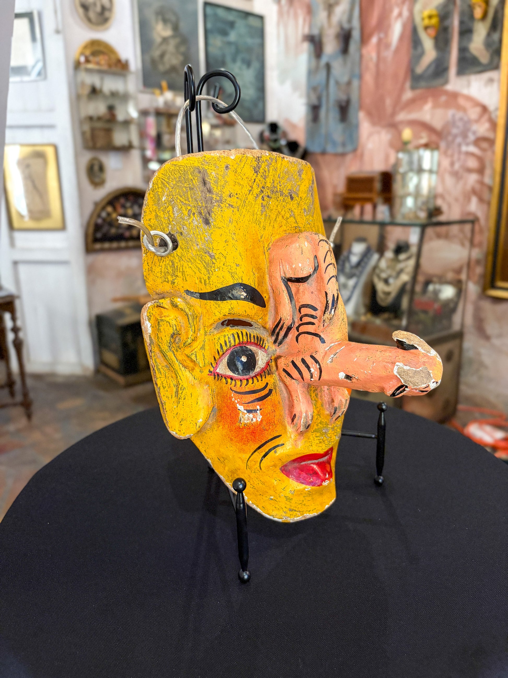Hand-carved painted wood dance mask with feline, Guerrero Mexican folk art, back view