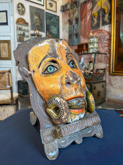 Handcrafted polychrome carved wood dance mask with serpent crossing the mouth, Chilapa Guerrero Mexico, circa 1950s, back view