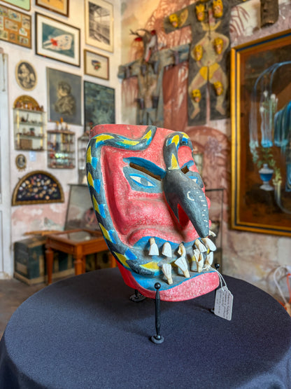 Handcrafted wood devil dance mask with real animal teeth and carved serpent, by maestro Victoriano Salgado, back view