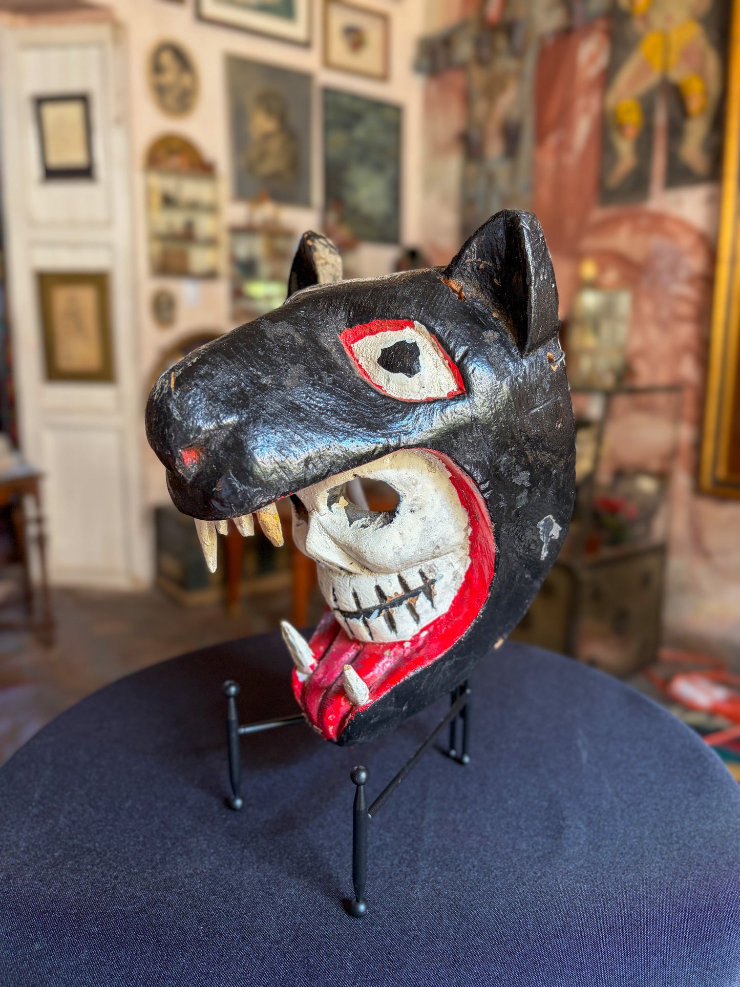 Handcrafted polychrome carved wood jaguar skull dance mask, Guerrero Mexican folk art, side view