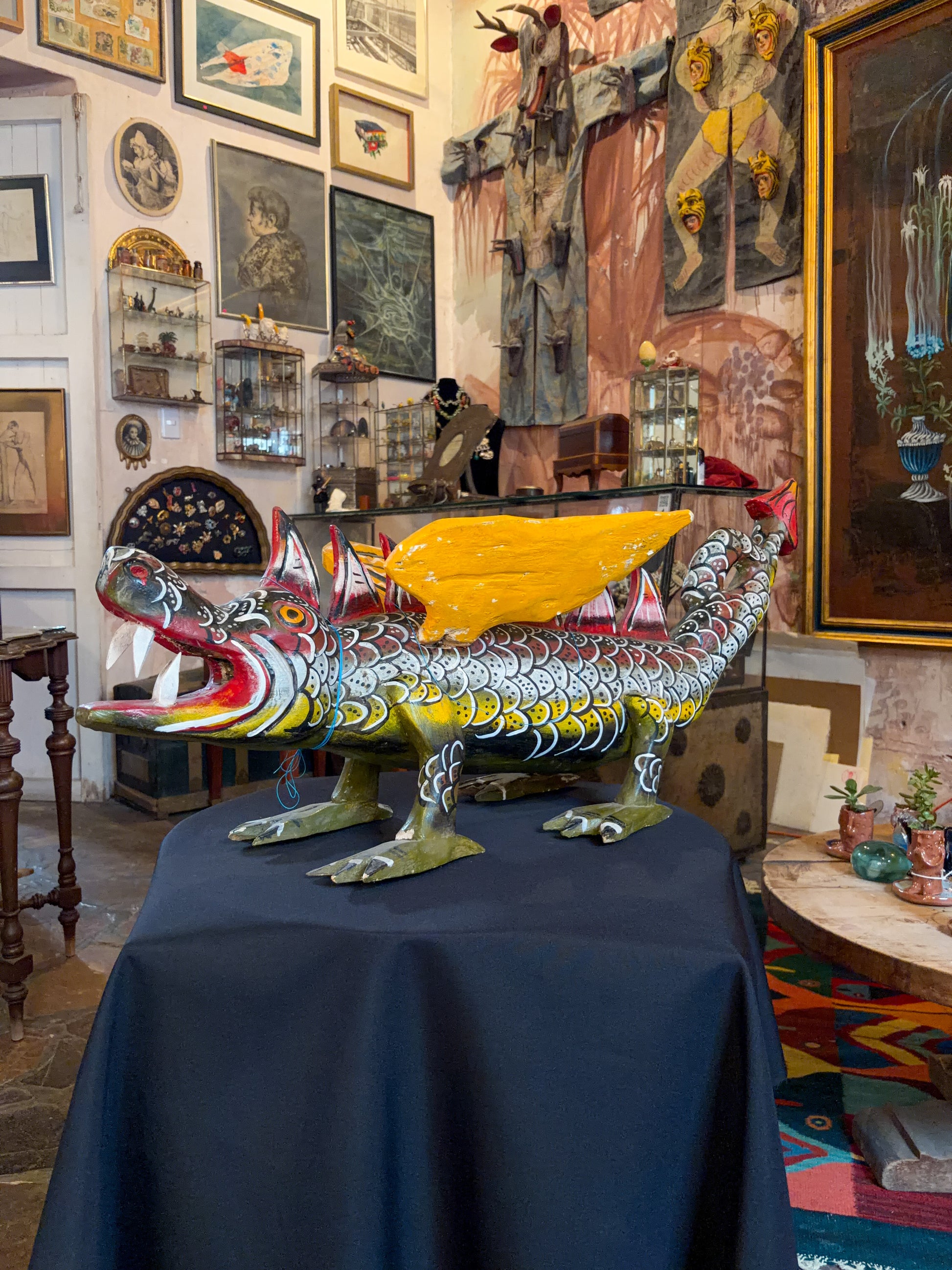 Polychrome carved wood winged dragon sculpture alebrije, Guerrero Mexican folk art, side view