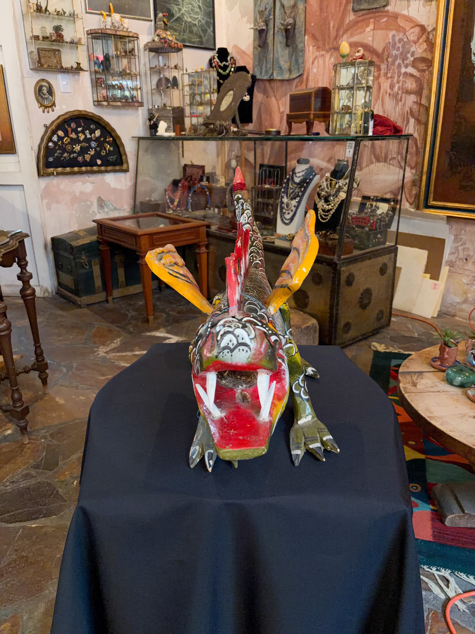 Polychrome carved wood winged dragon sculpture alebrije, Guerrero Mexican folk art, front-facing view, dragon face and open jaws